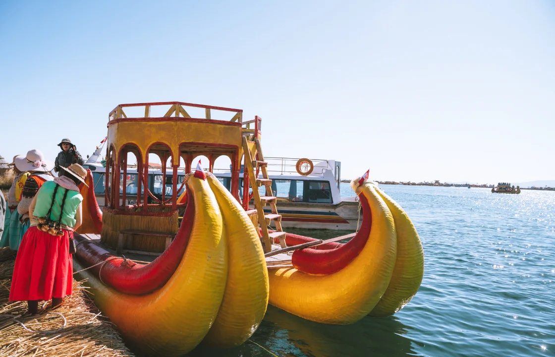 Close-up boats on Titicaca River | Peruvian Sunrise