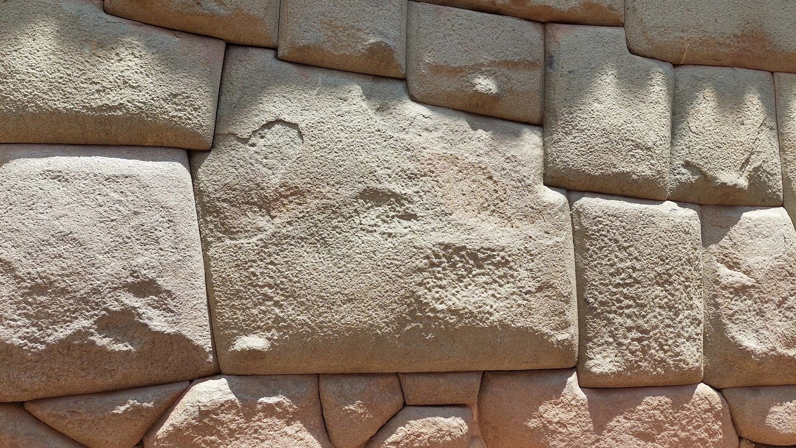 Twelve-angles stone Cusco Peru portrait | Peruvian Sunrise