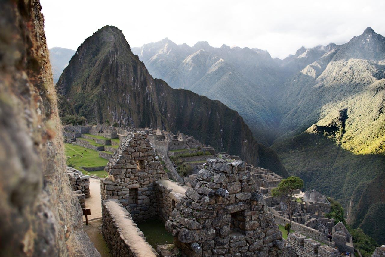 A sunny day in Machu Picchu ruins and mountains, lush green | Peruvian Sunrise