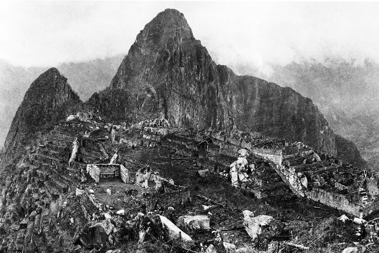 Photograph of Machu Picchu taken by Hiram Bingham III in 1912 after major clearing work had been undertaken | Peruvian Sunrise