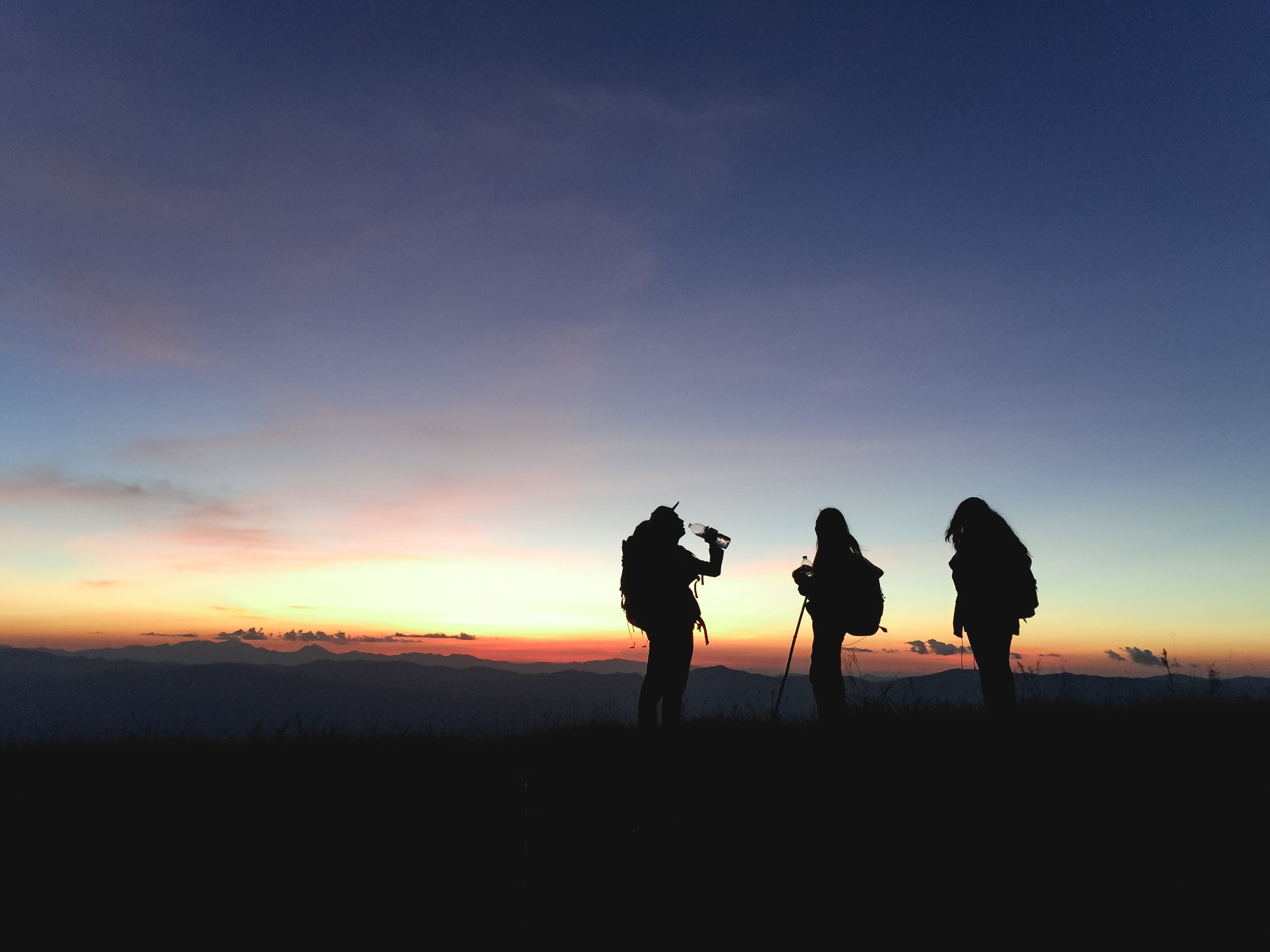 Three Persons Silhouette, Peru Trekking. 