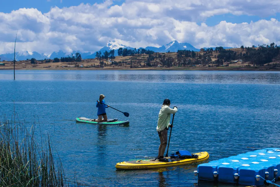 Glide through the calm waters of Piuray Lagoon | Peruvian Sunrise